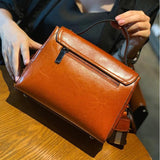 Oil wax cowhide handbag