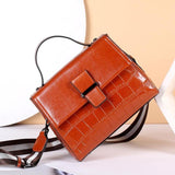 Oil wax cowhide handbag