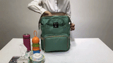 MULTI-FUNCTIONAL FASHION PORTABLE FOLDING CRIB BABY DIAPER BAG